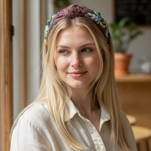 Load image into Gallery viewer, Woman wearing a floral headband indoors with a blurred background