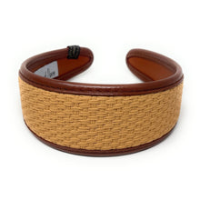 Load image into Gallery viewer, Tan and brown woven headband with textured pattern, lying on a white surface. The headband exudes a casual, earthy elegance.