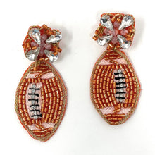 Load image into Gallery viewer, football Beaded Earrings, burnt orange football Earrings, football Earrings, Texas football, football earrings, Texas Longhorn earrings, Texas football earrings, Hook’em earrings, football seed bead earrings, football accessories, Hook’em horns accessories, Hook’em Texas earrings, Best selling items, birthday gifts, sport jewelry, sport bead earrings, football accessory, College gifts, Texas College earrings, game day earrings, Hook’em Longhorns,  Custom earrings, Boho earrings