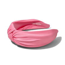 Load image into Gallery viewer, A pink knotted fabric headband with a satin-like sheen, featuring the brand name 'Twine and Love' printed in white script on the inside, shown on a white background with a soft shadow.