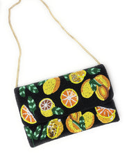Load image into Gallery viewer, Luxe fruit embellished foldover bag with sparkling citrus slice details