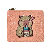 Load image into Gallery viewer, Sequined pouch with a beaded design of a capybara sipping bubble tea, featuring a small pink heart. Playful and whimsical vibe.