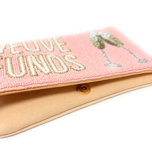 Load image into Gallery viewer, Chic champagne-themed beaded clutch with pearl lettering and sequined champagne glasses on a soft pink background.
