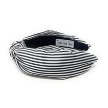 Load image into Gallery viewer, Black and white striped headband on a white background