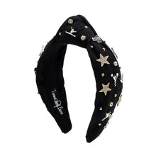 Load image into Gallery viewer, Black headband adorned with gold and silver embellishments, including stars, cheerleaders, and rhinestones, exuding a playful and glamorous vibe.