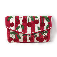 Load image into Gallery viewer, A rectangular clutch bag with an envelope-style flap, featuring a red and white striped pattern decorated with embroidered red cherries and green leaves, set against a plain white background.