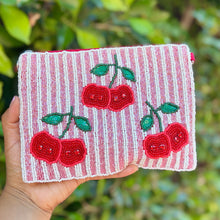 Load image into Gallery viewer, Handmade cherry beaded wallet featuring red fruit design on pastel striped background