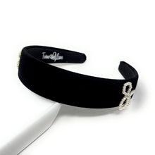 Load image into Gallery viewer, Close-up of velvet headband with handcrafted pearl bow accent