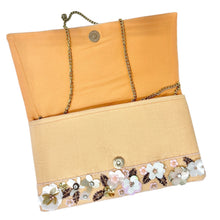 Load image into Gallery viewer,  Chic bag with flower embellishments, showcasing a blend of elegance and fashion.