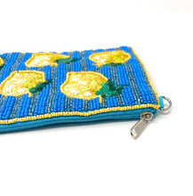 Load image into Gallery viewer, Tropical-inspired beaded pouch showcasing cheerful lemon designs, textured blue stripes, and sparkling handcrafted embellishments.