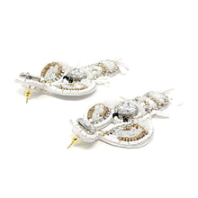 Load image into Gallery viewer, Statement lobster earrings with intricate beadwork, sparkling gemstones, and elegant white and gold tones.