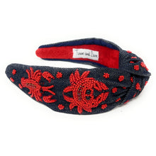 Load image into Gallery viewer, Handmade denim headband featuring vibrant red crab beadwork, twisted knot detail, and playful coastal-inspired embroidery.