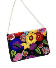 Load image into Gallery viewer, Colorful flower purse with intricate beadwork, bold botanical motifs, and a black envelope-style design.