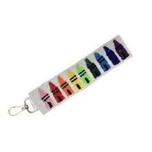 Load image into Gallery viewer, Keychain with colorful crayon design on a white background