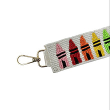Load image into Gallery viewer, Keychain with colorful crayon design on a white background