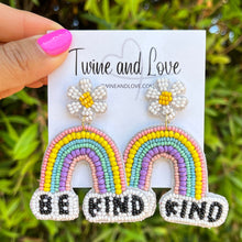 Load image into Gallery viewer, Colorful beaded rainbow earrings with daisy flower studs and “Be Kind” message for a fun cheerful statement look.