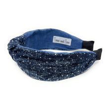 Load image into Gallery viewer, Blue denim headband with a knotted design, adorned with small rhinestones. The fabric texture adds a casual yet chic touch.