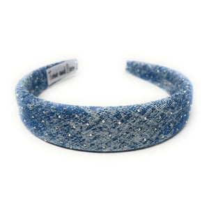 Blue glittery headband on a white background