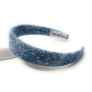Blue glittery headband on a white background