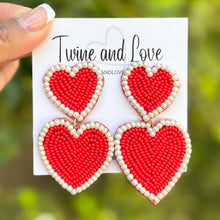 Load image into Gallery viewer,  double red hearts Beaded Earrings, red valentines Earrings, Valentines Day Earrings, Valentines Beaded Earrings, Valentines Heart earrings, red hearts earrings, valentine’s day beaded earrings, dainty valentines beaded earrings, valentines beaded earrings, red cute earrings, Valentine’s day earrings, tween girls accessories, Valentine’s day accessories, Best selling items, Valentine’s day accessories, boho earrings, custom earrings, gifts for her, handmade gifts, custom unique valentines heart earrings
