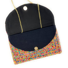 Load image into Gallery viewer, Vibrant statement clutch adorned with multicolored beadwork, showcasing a large floral design against a black background.