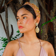 Load image into Gallery viewer, Elegant model showcasing a pink outfit with a stylish headband and earrings.