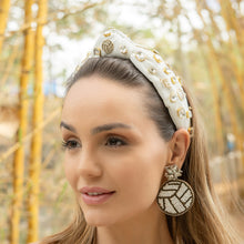 Load image into Gallery viewer,  Close-up of a woman's face showcasing a decorative headband and intricate earrings.