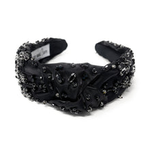 Load image into Gallery viewer, Elegant black headband adorned with sparkling crystals and gemstones. The luxurious fabric is delicately ruched, creating a sophisticated and glamorous look.