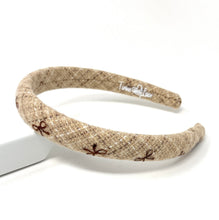Load image into Gallery viewer, Embroidered bow design on a beige headband, perfect for casual wear.
