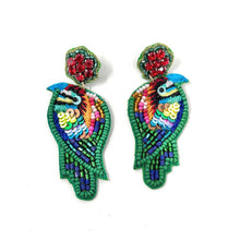 Load image into Gallery viewer, Handmade tropical bird statement earrings featuring vibrant multicolor beadwork, green edging, and bright floral rhinestone accents.