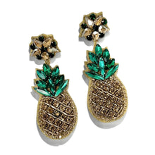 Load image into Gallery viewer, Sparkling pineapple-shaped statement earrings featuring gold crystal detailing, emerald green gemstones, and floral-inspired stud tops.
