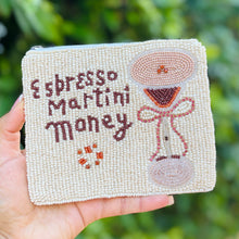 Load image into Gallery viewer, Cream-colored beaded pouch with the text &quot;Espresso Martini Money&quot; and an illustration of a cocktail glass. The design is playful and stylish.