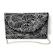 Load image into Gallery viewer, Evening clutch adorned with elegant black and white beadwork