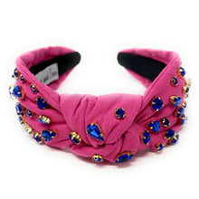 Load image into Gallery viewer, Elegant outdoor portrait of a woman accessorized with a pink crystal headband and sparkling navy statement earrings.