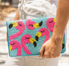 Load image into Gallery viewer, Turquoise beaded clutch purse with pink flamingo pattern and vibrant tropical design.