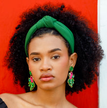 Load image into Gallery viewer, Handcrafted flamingo headband featuring vibrant pink beadwork, tropical leaf accents, and sparkling embellishments for a bold statement look.