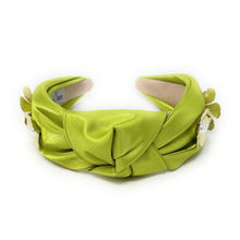 Load image into Gallery viewer, Elegant green headband with floral embellishments and pearls.