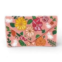 Load image into Gallery viewer, Floral Easter patterned clutch bag on a white background