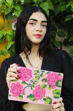 Load image into Gallery viewer, Elegant beaded clutch featuring blooming pink floral embroidery and lush green leaves on a soft blush pink background.