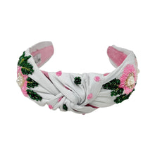 Load image into Gallery viewer, Floral patterned headband on a white background
