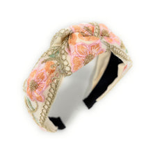 Load image into Gallery viewer, Embroidered headband with pink and orange floral patterns and green leaves on a cream background. Textured, elegant, and stylish accessory.