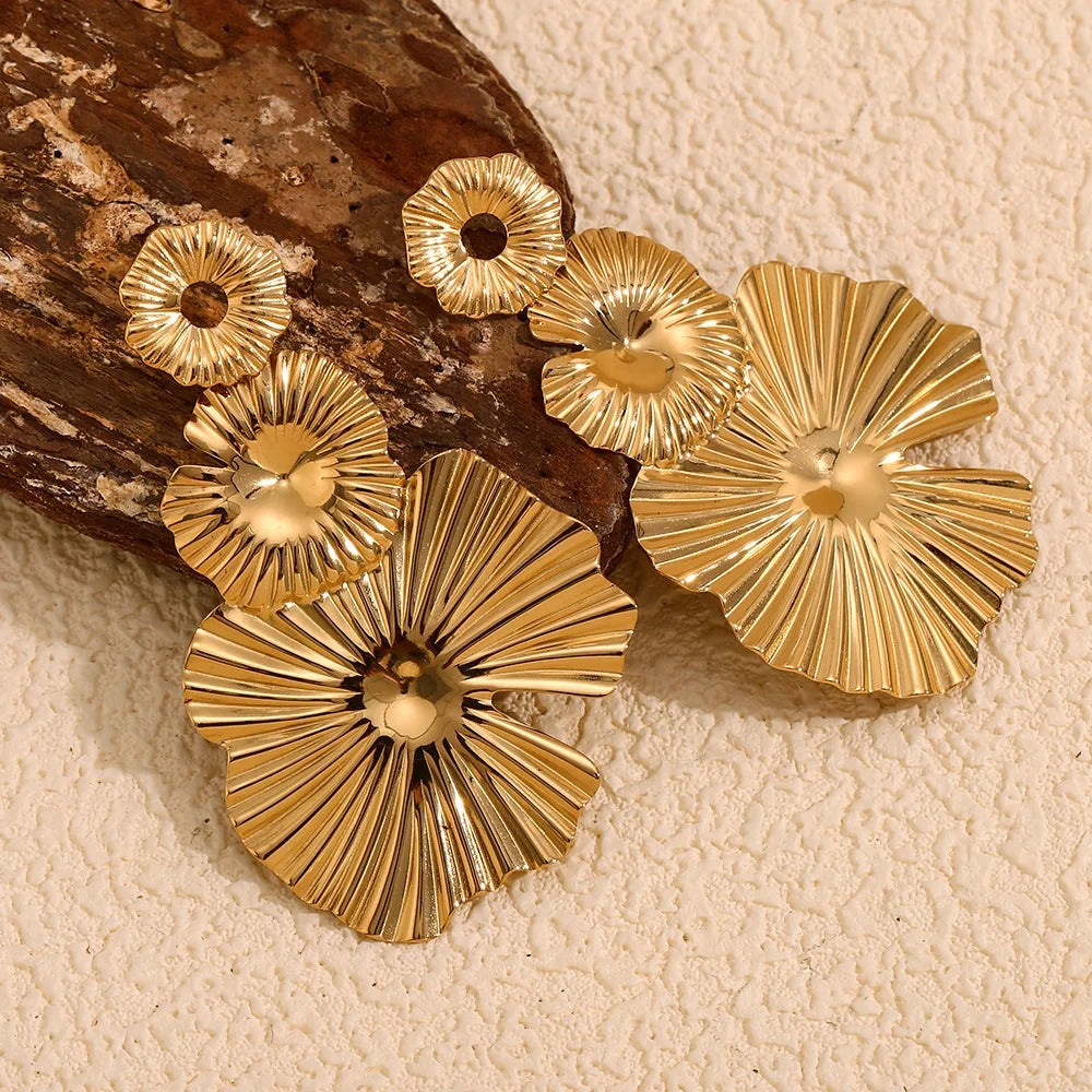 Flower Drop Pair of 18k gold plated earrings on a white background