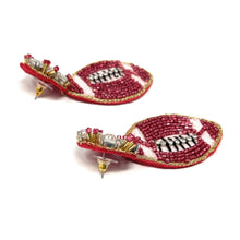 Load image into Gallery viewer, Game day football earrings showcasing a realistic football design with shimmering bead details and eye-catching sparkle.