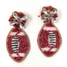 Load image into Gallery viewer, Bold football earrings with intricate bead embroidery and sparkling embellishments, perfect for football fans and game day outfits.