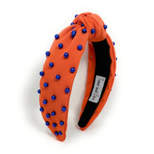 Load image into Gallery viewer, headbands for women, blue orange headband, handmade headbands,  orange blue top knotted headband, Go Gators Florida knotted headband, Florida university Headband, Go Gators headband, blue pearl headband, blue orange game day headband, football headband, jeweled headband, knotted jeweled headband, Florida football headband, Florida Gators knot headband, Gators Florida knot headband, pearly headbands, Orange headband, game day hair accessories, game day headband, football headbands, best selling items