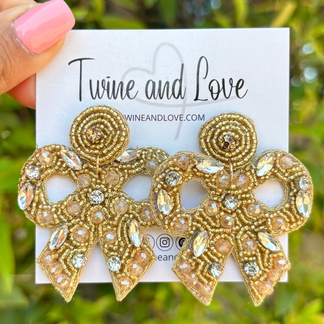 custom beaded Earrings, bow jeweled Earrings, gold Beaded Earrings, bow earrings, summer jeweled earrings, handmade earrings, custom earrings, party accessories, fancy accessories, bow embellished earrings, custom earrings, best friend gifts, birthday gifts, bohemian earrings, luxurious handmade accessories, night jewelry, Fancy earrings, boho earrings, beaded earrings, Fancy jeweled earrings, statement earrings, best selling items, statement earrings, handmade gifts, custom gifts, gold bow