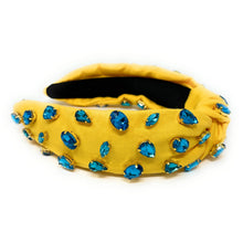 Load image into Gallery viewer, Fashion portrait featuring a rhinestone yellow headband, sparkling blue earrings, and chic tropical styling.