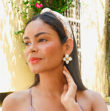 Load image into Gallery viewer, Chic summer look featuring a natural straw-style padded headband paired with flower earrings.