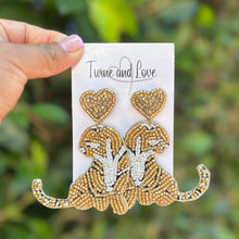 Load image into Gallery viewer, Gold hand beaded tiger statement earrings with sparkling heart-shaped studs.