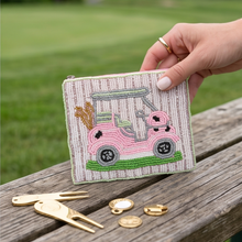 Load image into Gallery viewer, Pink golf cart hand-beaded pouch with gold golf clubs and white beaded background by Twine and Love.